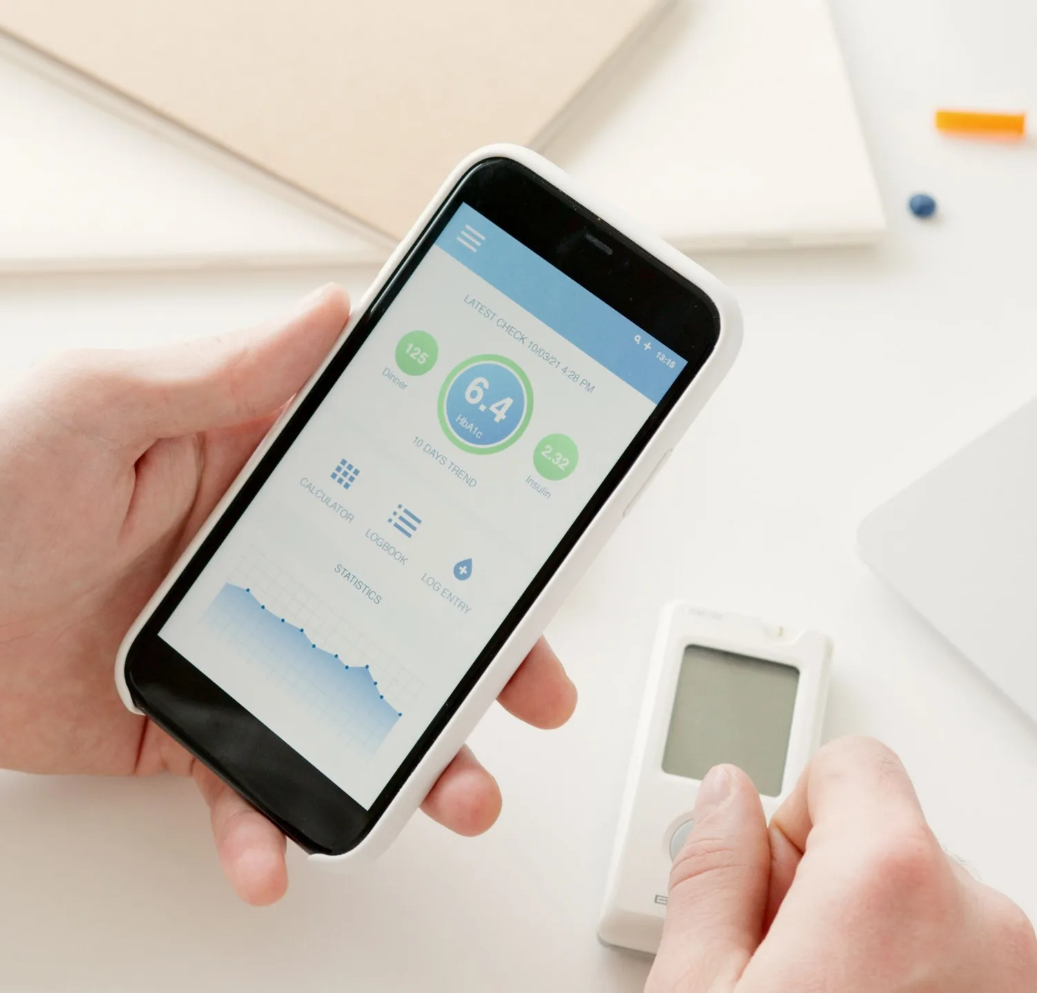 Patient using app to monitor glucose
